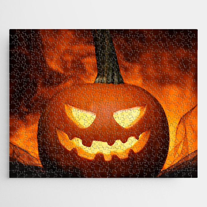 Carved Pumpkin for Halloween on Dark Background Jigsaw Puzzle