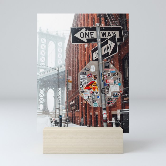 Street sign in snow near Manhattan Bridge Mini Art Print