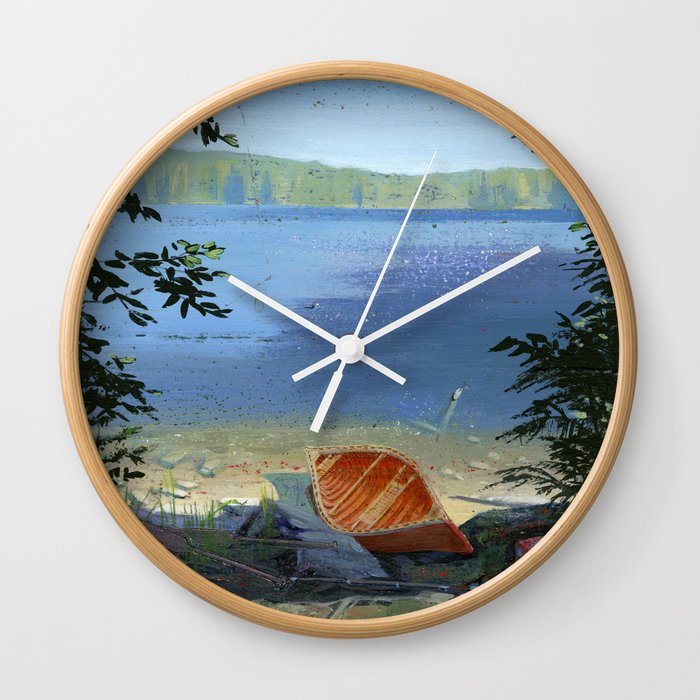 canoe on shore Wall Clock