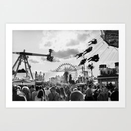 Amusement park with crowd and spinning carousel Art Print