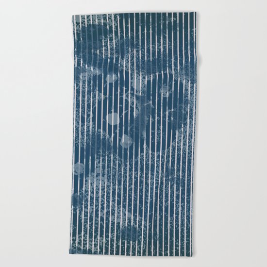 White stripes on grunge textured blue background Beach Towel