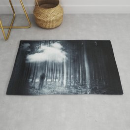 mindscape - man walking in forest Rug