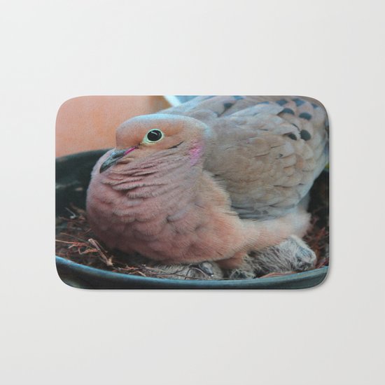 Baby Bird Peeking out at the World Bath Mat