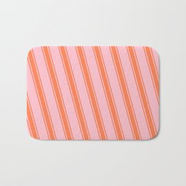 [ Thumbnail: Pink & Coral Colored Striped Pattern Bath Mat ]