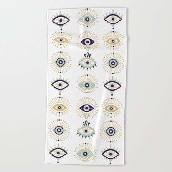 Evil Eye Collection on White Beach Towel