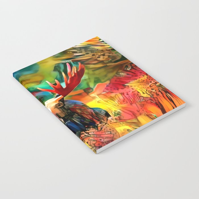 Colorful moose lying in the grass Notebook