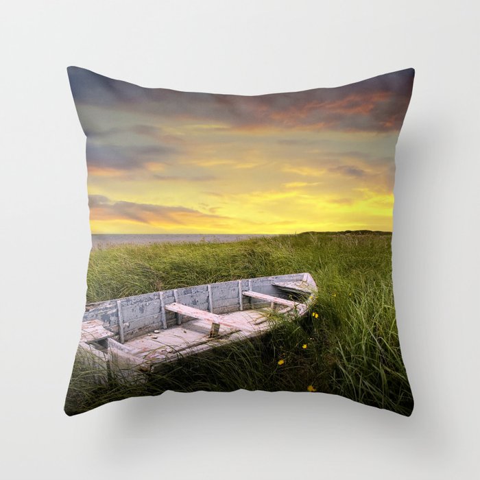 Stranded Row Boat in the Beach Grass at Sunrise on the shore on Prince Edward Island Throw Pillow