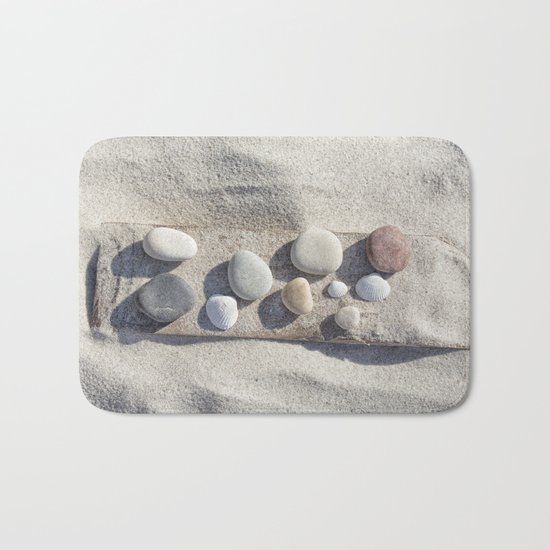 Beach pebble driftwood still life Bath Mat