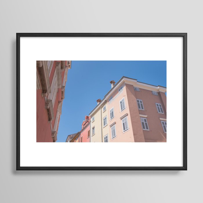 Closed shutters on a sunny day | Old facades against a blue sky |The old town of Rovinj in Croatia Framed Art Print