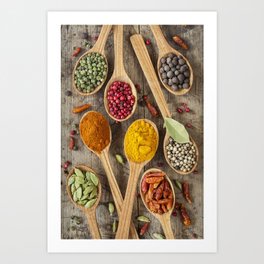 Colorful spices in wooden spoons Art Print