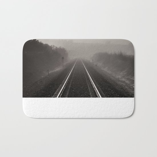 "Bird through the foggy railway" Bath Mat
