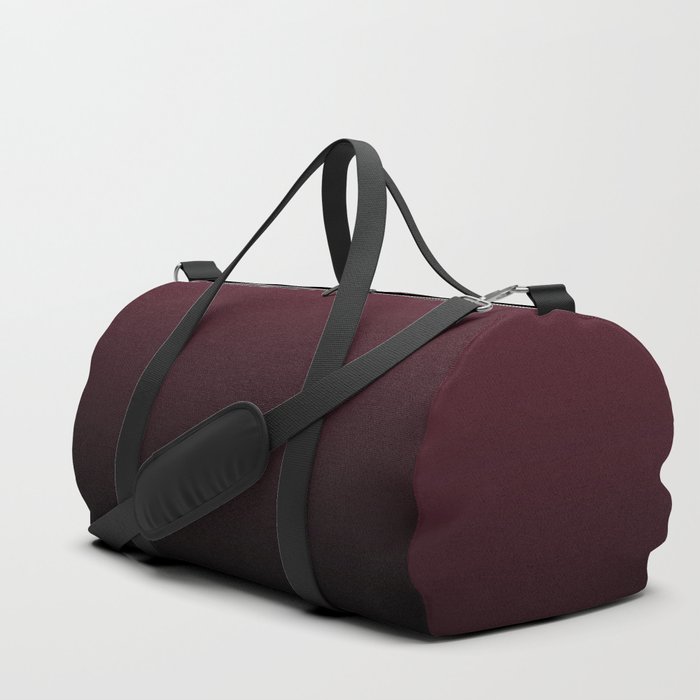 burgundy duffle bag