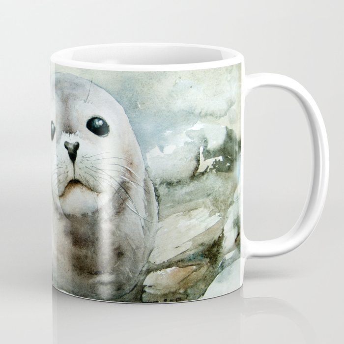 Curious seal on the pebbles Coffee Mug
