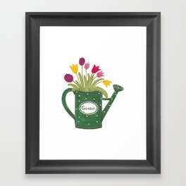 Green watering can with colorful spring bouquet Framed Art Print