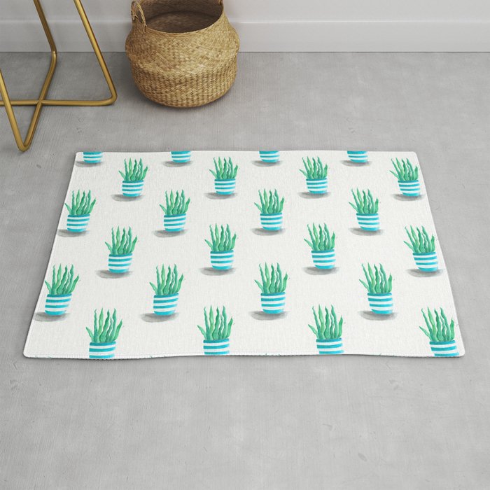 Succulents in a turquoise pot Rug