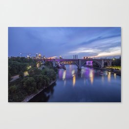 Illuminated Minneapolis and Mississippi River Birdges during a Summer Twilight Canvas Print