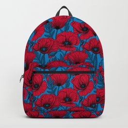 Red poppy garden on blue Backpack