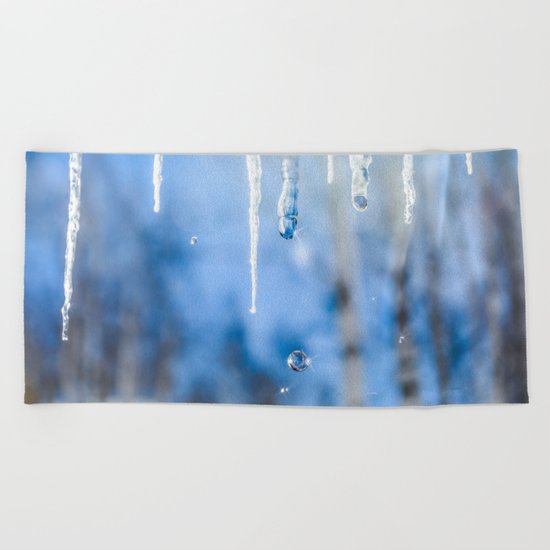 Icicles and drops in a birch grove Beach Towel