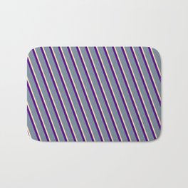 [ Thumbnail: Indigo, Light Slate Gray, and Tan Colored Pattern of Stripes Bath Mat ]