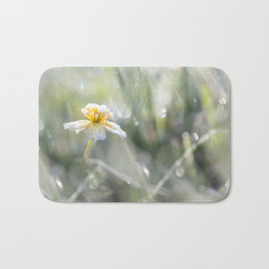 The last frost- Frozen buttercup Bath Mat