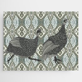 Guinea fowl from the African savannah walking on a patterned background Jigsaw Puzzle