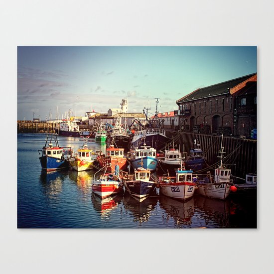 Boats resting in the Harbour Canvas Print