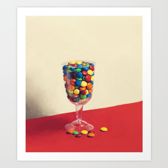 M&Ms in a wine glass. Art Print by Sushrut Karnik