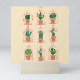 Cactus in birdcage Mini Art Print