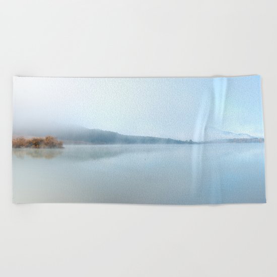 "Wild sunrise". Foggy lake Beach Towel