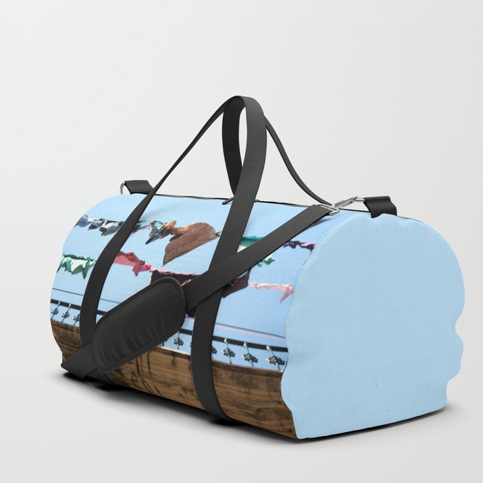 Hanging laundry in blowing wind Duffle Bag