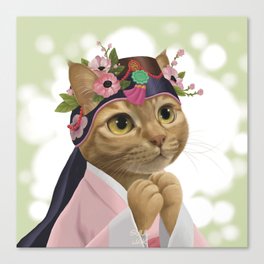 A cat wearing an 'ayam' Canvas Print