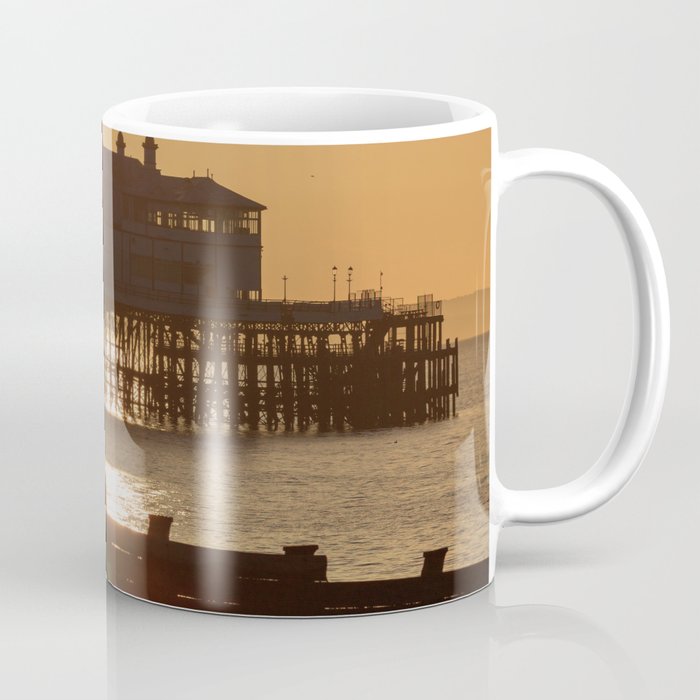 Beautiful sunrise over English Channel horizon and Eastbourne pier, East Sussex, UK Coffee Mug