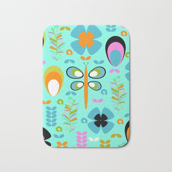 Dragonfly in the garden Bath Mat