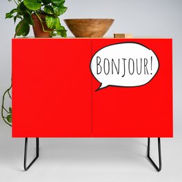 Cheerful BONJOUR! with white cartoon speech bubble on bright comic book red (Français / French) Credenza