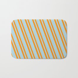 [ Thumbnail: Dark Orange & Light Blue Colored Lined Pattern Bath Mat ]