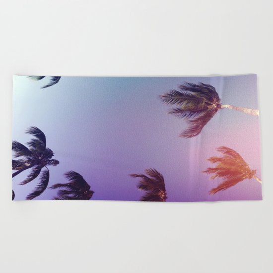 Under tall Palm trees Beach Towel