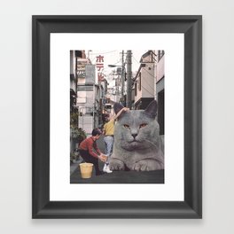 Children washing a giant Cat in Tokyo Streets Framed Art Print