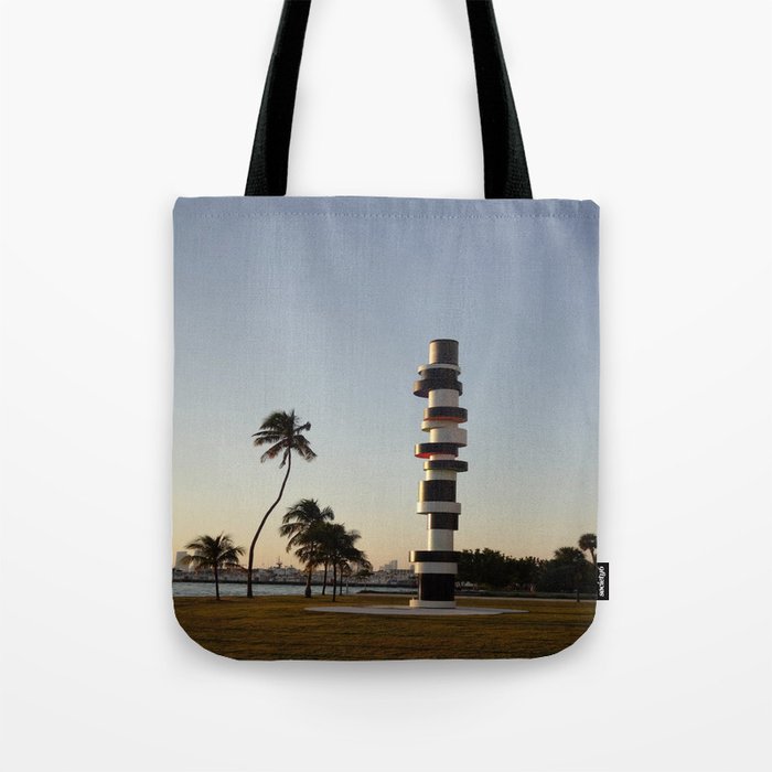 Lighthouse and a Sunset Tote Bag