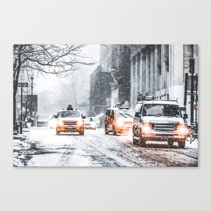 New York City yellow taxi during winter snowstorm blizzard in Manhattan Canvas Print