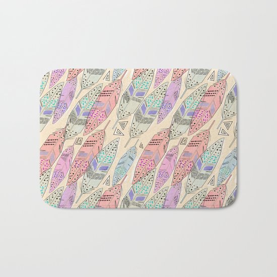 The feathers are multicolored on a beige background . Bath Mat