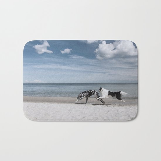 Running dogs at the beach Bath Mat