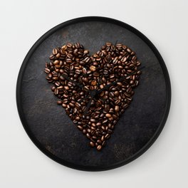 Coffee beans in shape of heart on dark rustic background, flat lay Wall Clock