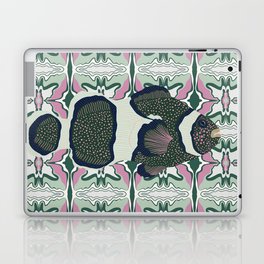 Clownfish swimming on a green and pink patterned background Laptop Skin