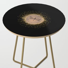 Sketched Dragonfly and Gold Circle Frame on Black Side Table