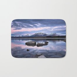 New Zealand Photography - Stones In The Water Under The Cloudy Pink Sky Bath Mat