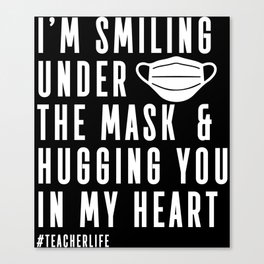 Teacher Smiling Under Mask Hugging In Heart Canvas Print