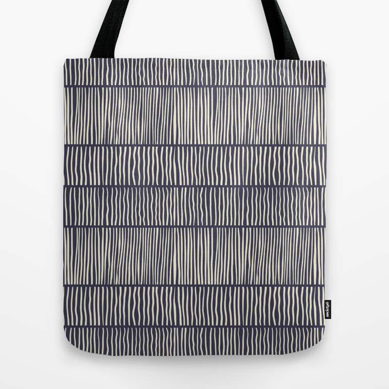 navy and cream bag