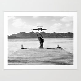 Steady as she goes girl in bikini on a dock with plane landing black and white photograph Art Print