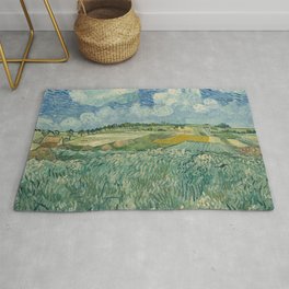 Plain at Auvers with rain clouds Rug