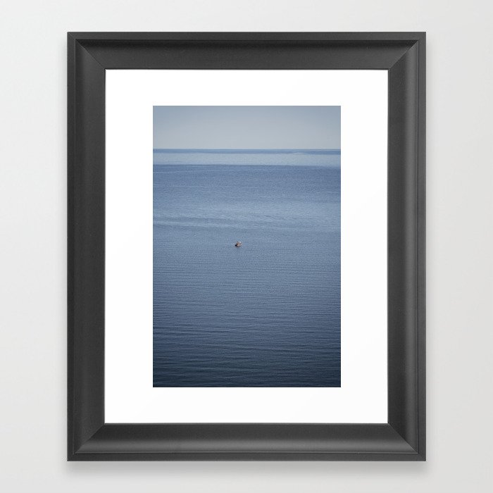 Solitary Boat Adrift on Lake Michigan's Azure Vastness Framed Art Print
